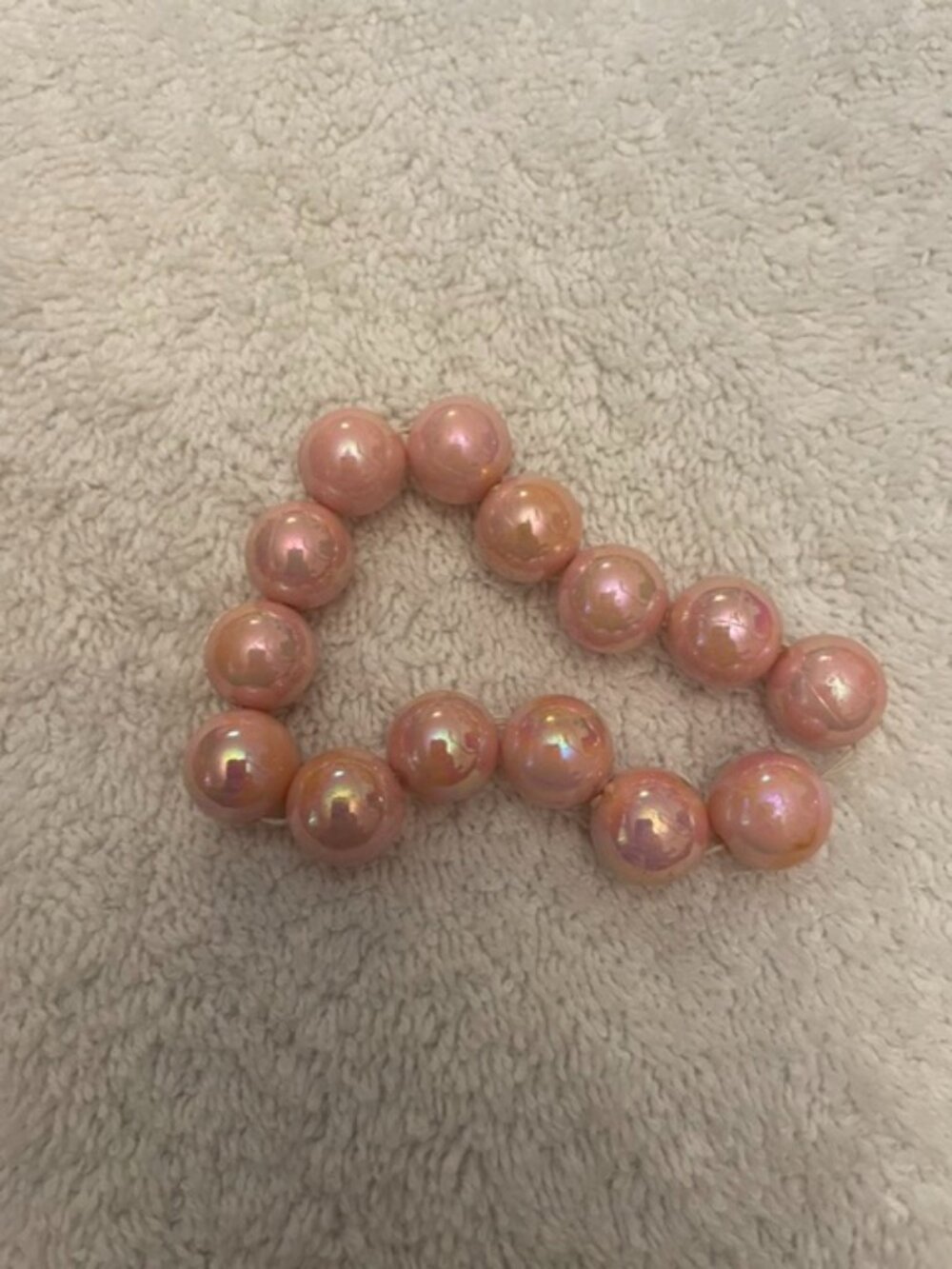 Pink stretch bracelet made of large pearlized beads